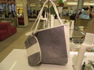 This is the FREE Gift-With-Purchase that they are offering at Sak's. It comes in your choice of  3 shades. *Tote free with $100.00 beauty and fragrance purchase and the Cosmetic Case is free when you spend $150.00