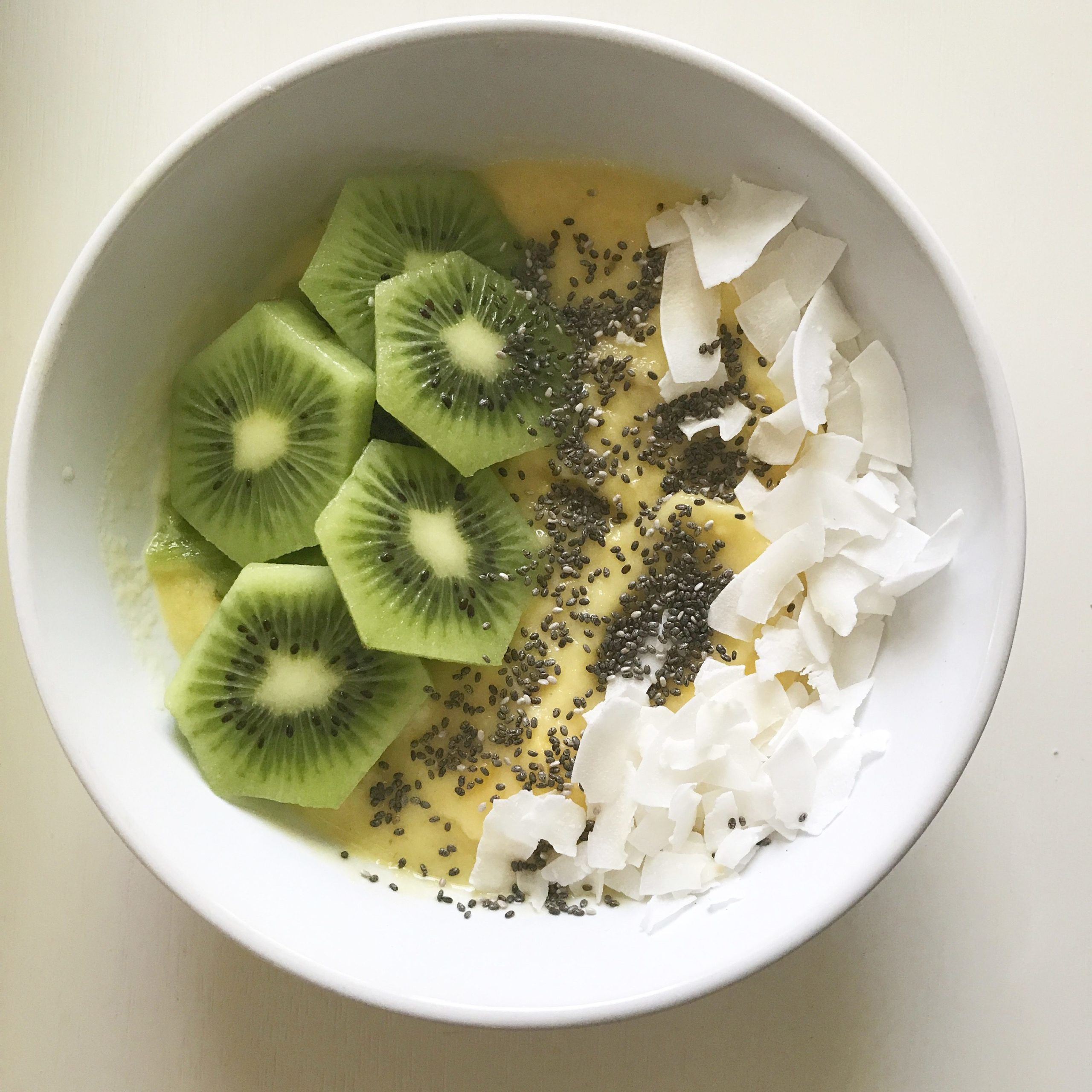 Looking for a new Breakfast recipe? This Mango Pineapple Smoothie Bowl is so easy to prepare and so good!