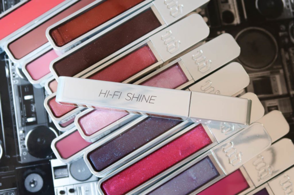 Lip Glosses with A Lip Gloss turned on it's side that says Hi-Fi Shine