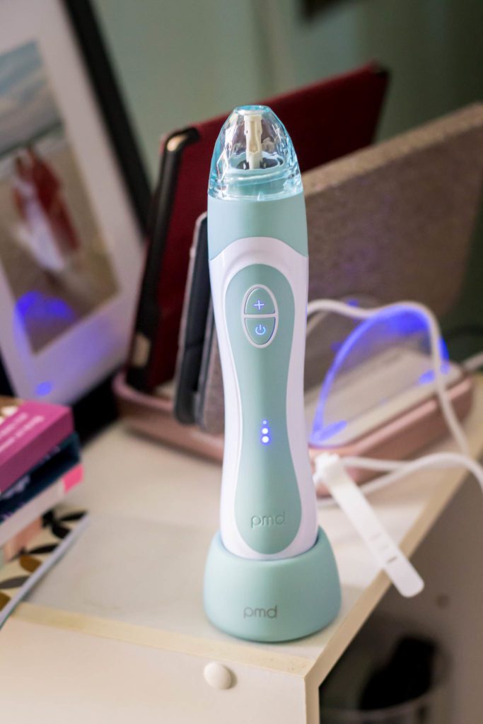 PMD Personal Microderm Elite Pro on charging base