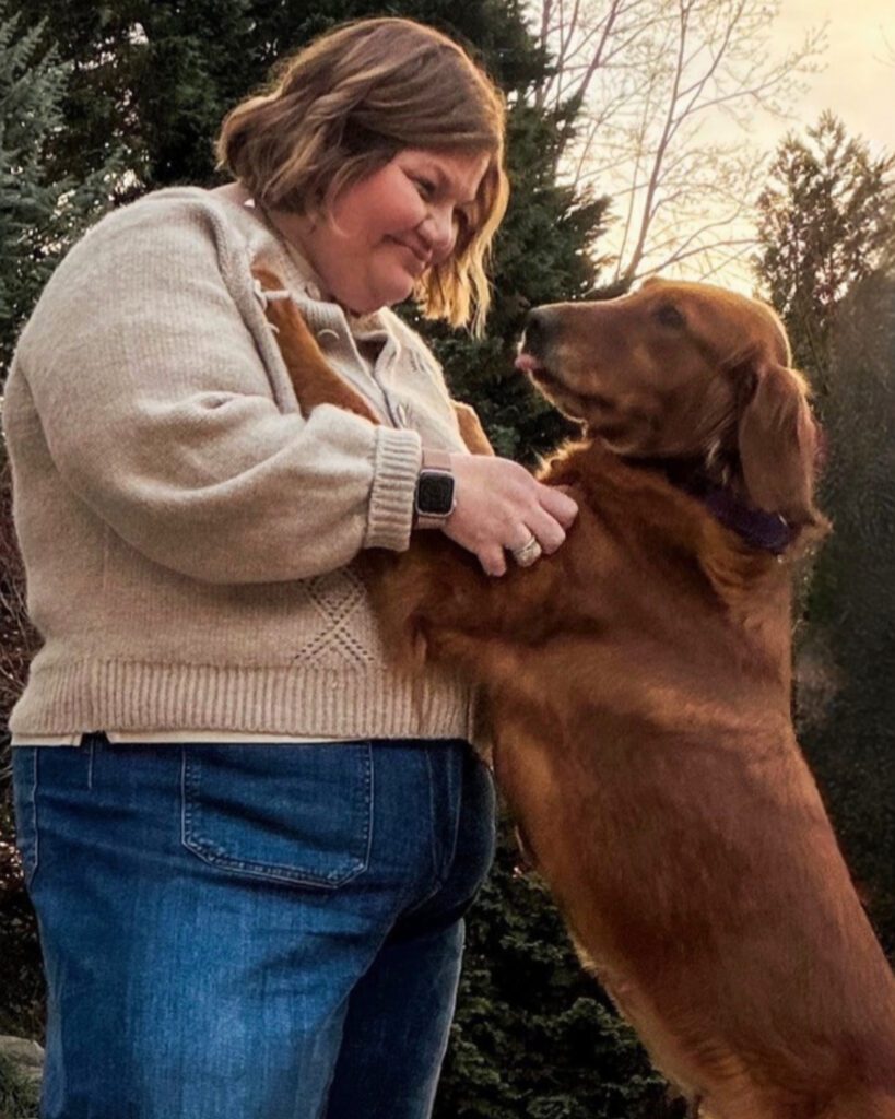 Christine with her golden retriever, Penelope